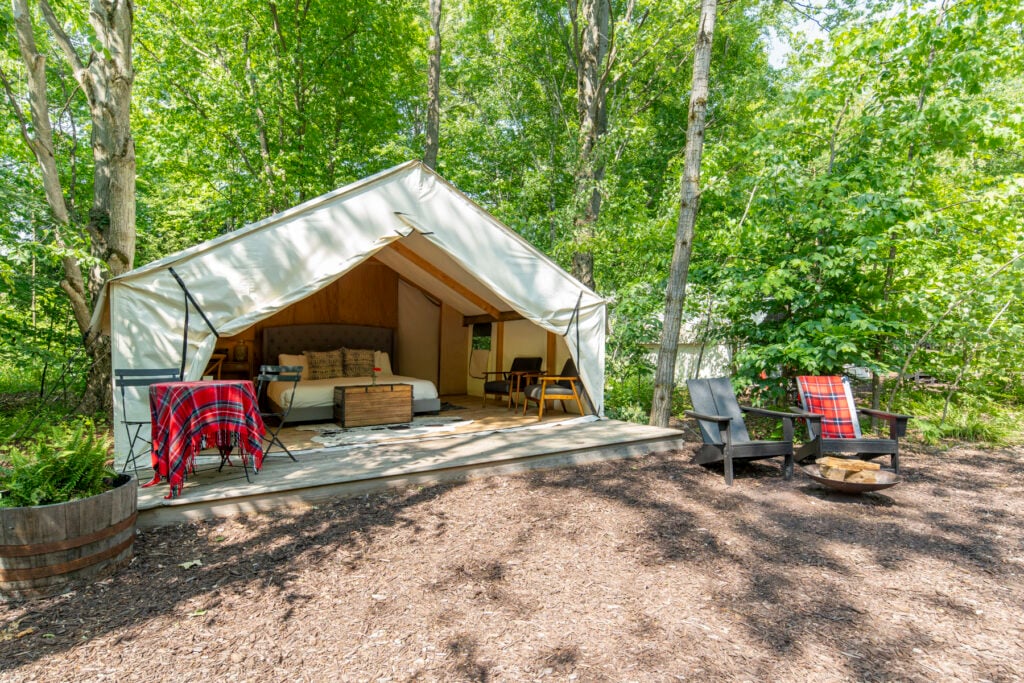 Fields Tent Exterior chairs table fire pit